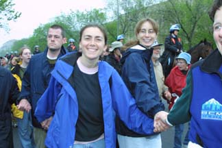Sheila Stumph (center) and Scott Langley (left) at a Washington D.C. action in April 2002.